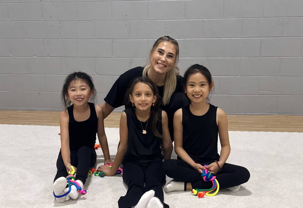 Coach Nastia with her youngest gymnasts at Signature Rhythmic Gymnastics